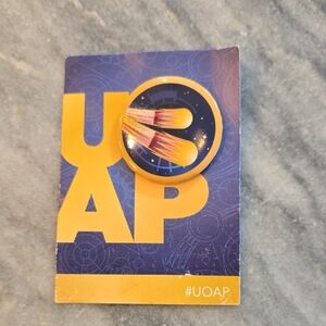 UOAP Pin with Yellow and Orange Design